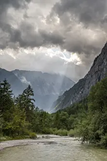 Torrener Ache in the Bluntau valley with dramatic clouds