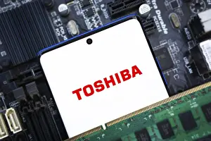 Category Historic EN Prints: Toshiba logo is displayed on smartphone