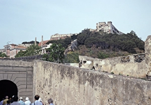 Tour group on the Via Victor Hugo below the historic Fort Falcone, Portoferraio, Elba Island, Italy, 1999, Europe