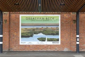 Tourism promotion billboard poster at railway station