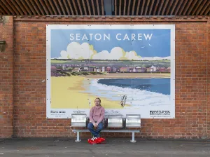Tourism promotion billboard poster at railway station