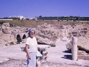 Tourist exploring a Roman archaeological site in Tunisia, 1967