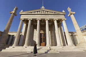 Tourists photographing the Academy of Athens