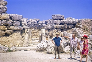Tourists at prehistoric neolithic archaeological site, megalithic temple complex, ggantija, Gozo, Malta, Europe 1971, Europe