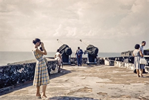 Tourists taking photos of the historic fortress, San Juan, Puerto Rico 1961