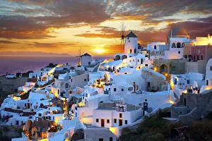 Townscape with windmills at sunset