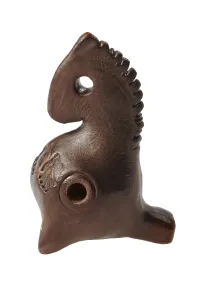 Toy horse whistle isolated on white background