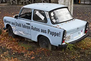 Framed Print : Trabi with the inscription Maenner aus Stahl fahren Autos aus Pappe Framed Print : Trabi with the inscription Maenner aus Stahl fahren Autos aus Pappe