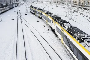 Tracks and train covered with snow and ice