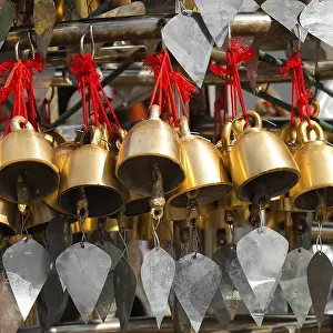 Traditional Buddhist wind bells hanging near Golden Rock