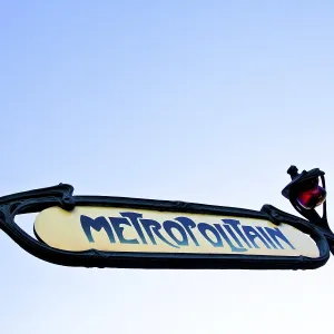 Traditional entrance sign of metro station in Paris