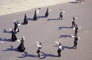 Traditional folk dancers perform on the quay for the spectators of a cruise ship, Vigo, Spain, Europe