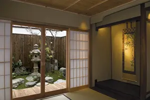 Framed Print : Traditional home interior, living room with sliding doors looking into a Japanese garden