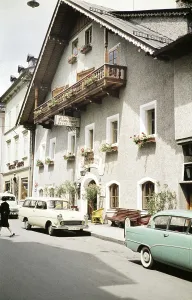 Traditional inn restaurant building, Gasthof Fischerwirt, Zell am See, Austria, Europe 1960 Opel Rekord Caravan car, Europe