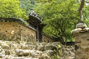 Traditional Korean temple steps leading to the main gate