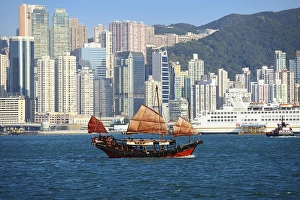 Traditional sailboat, junk in front of the skyline