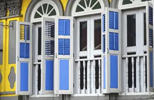 Framed Print : Traditional windows with colorful shutters and colonial architecture Framed Print : Traditional windows with colorful shutters and colonial architecture