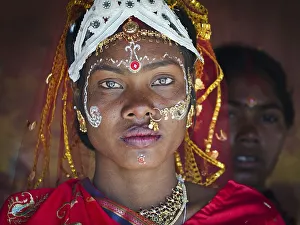 Traditionally dressed bride wearing jewellery