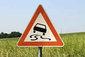 Traffic sign, slippery when wet
