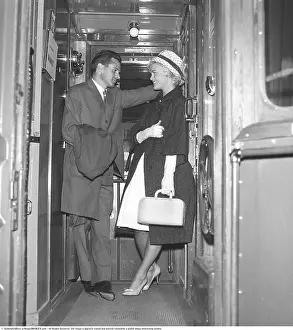 Train travel in the 1960s. A couple on a train