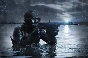 Trained commander of the Marines emerged with a scuba gear and moves to the target with weapons in his hands