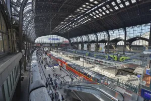 Trains, passengers, platform, station concourse