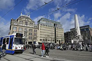 Tram, National Monument and De Bijenkorf shopping centre on Dam Square