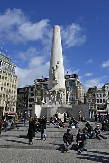 Tram, National Monument and De Bijenkorf shopping centre on Dam Square