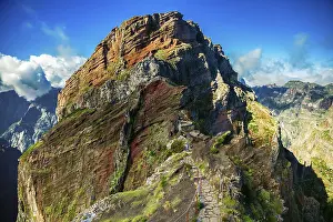 Trekking path leading to the big cliff at the Pico do Arieiro surrounding areas