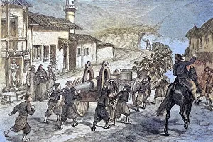 Turkish children pulling a Krupp canon through a village at Erzurum to their destination