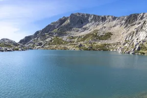 Framed Print : Turquoise lake with rocky mountains reflecting blue sky in Ghisoni Framed Print : Turquoise lake with rocky mountains reflecting blue sky in Ghisoni