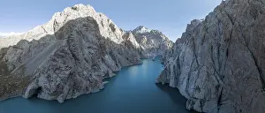 Category Mountain Landscapes Prints: Turquoise mountain lake Kol Suu with rocky steep mountains