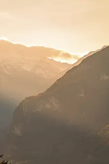 Twilight over the mountains in the soft light of the sunset