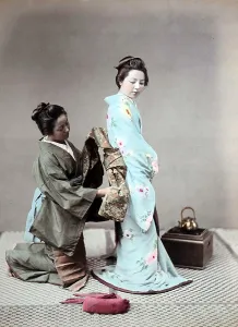 Tying kimono belt, Japan, Asia