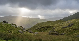 Typical landscape with mountains behind clouds in late summer