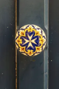 Typical Maltese richly decorated door knocker