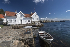Category Scandinavia Prints: Typical Swedish house near the water with fishing boat