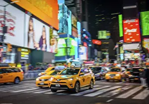 Typical yellow taxis in traffic