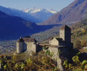 Tyrol Castle near Merano in autumn with a view of the Vinschgau Valley South Tyrol