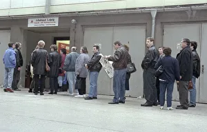 Unemployed people in a queue at the Leipzig job centre