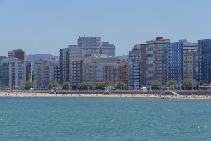 Urban skyline on the waterfront with tall buildings and clear sky