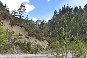 A valley with a torrent, view and hiking trail in Steinberg am Rofan