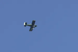 Van's RV-9 light aircraft flying in a blue sky