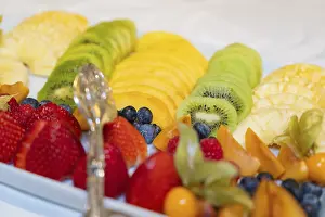 Variety of fresh fruit arranged on a plate