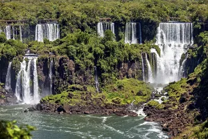 Various waterfalls flow over rocky cliffs