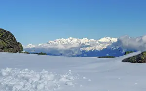 Category Mountain Landscapes Prints: Vast snowy landscape with views of white mountain peaks in South Tyrol and blue skies