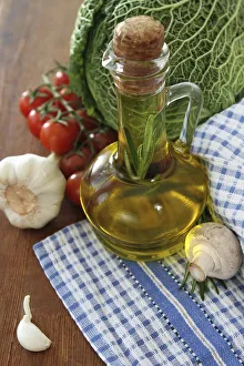 Vegetables still life with olive oil