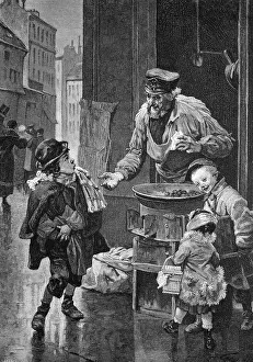 Vendor selling roasted chestnuts in the streets of Paris