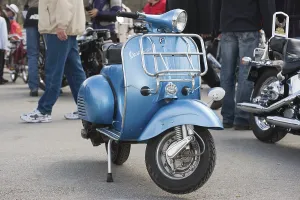 Vespa motor scooter at a classic car convention