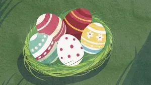 A vibrant nest filled with decorated eggs rests among soft green grass